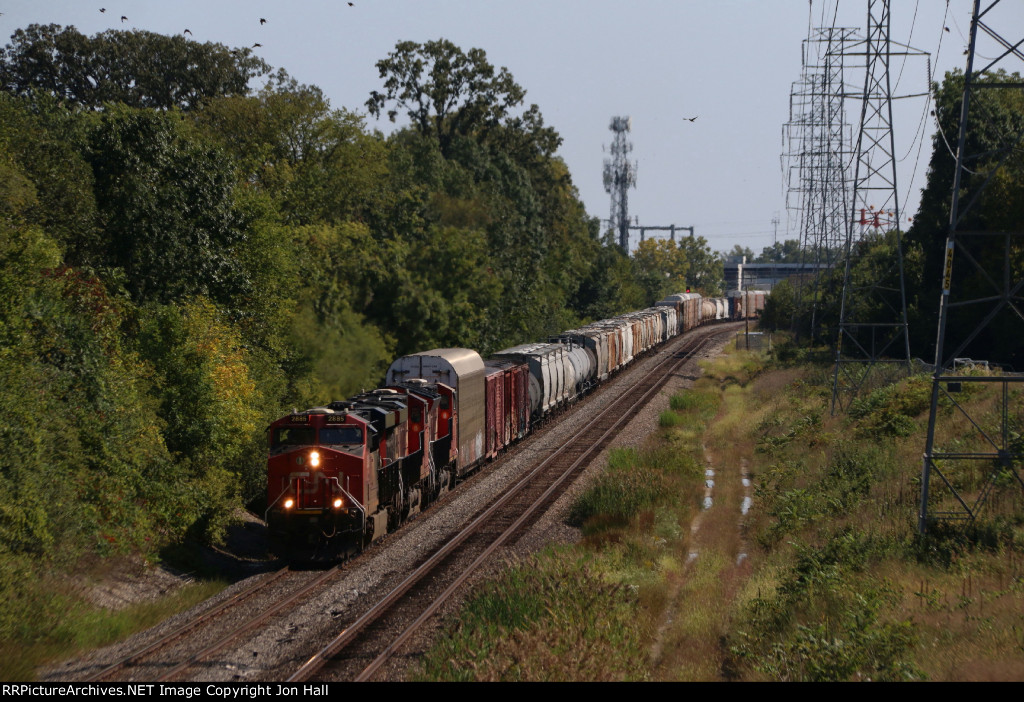 With 13,000 feet  of train, E251 comes north up the Holly Sub